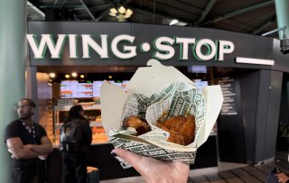Wat maakt de chicken wings van Wingstop wereldwijd zo populair?